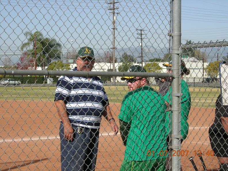 Coach Art and "little Mike" conferring